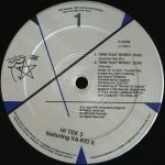 Hi Tek 3 Featuring Ya Kid K – Spin That Wheel (Turtles Get Real!) 12'' Maxi Single Plak - Görsel 3